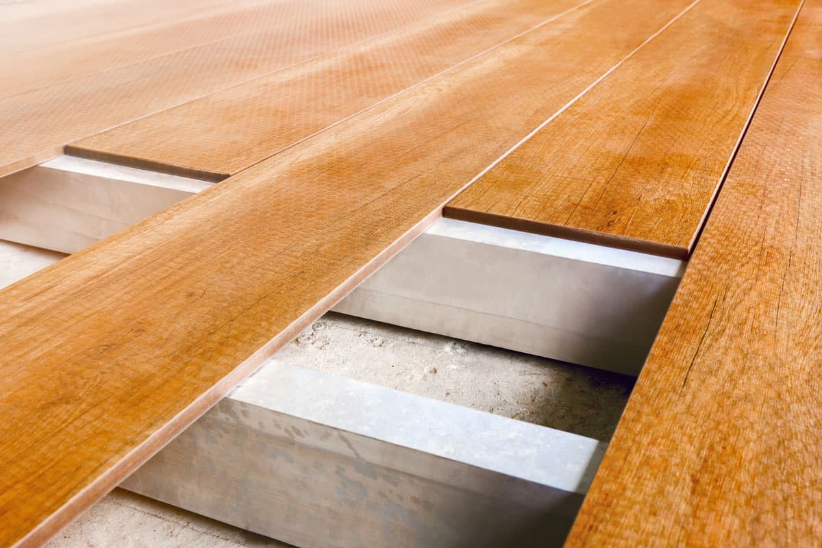 Construction floor installation wooden work flooring wood plank