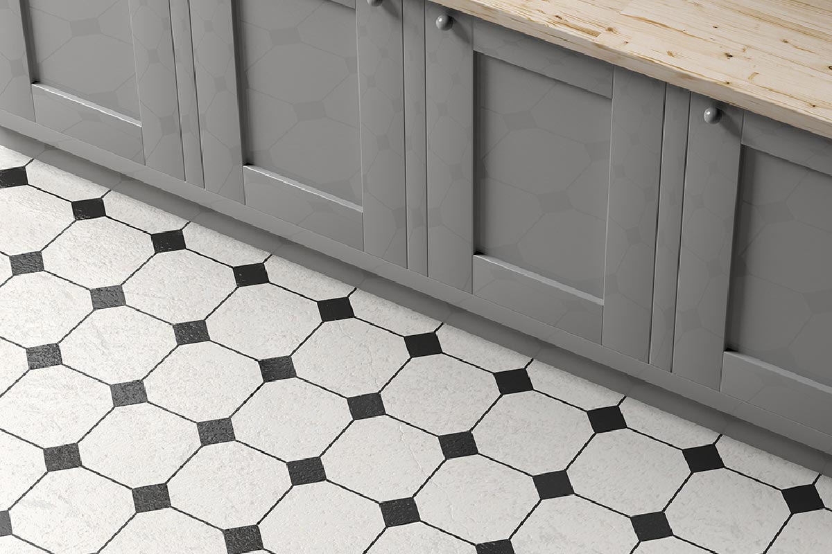 Kitchen cabinet on white and black ceramic tiles floor