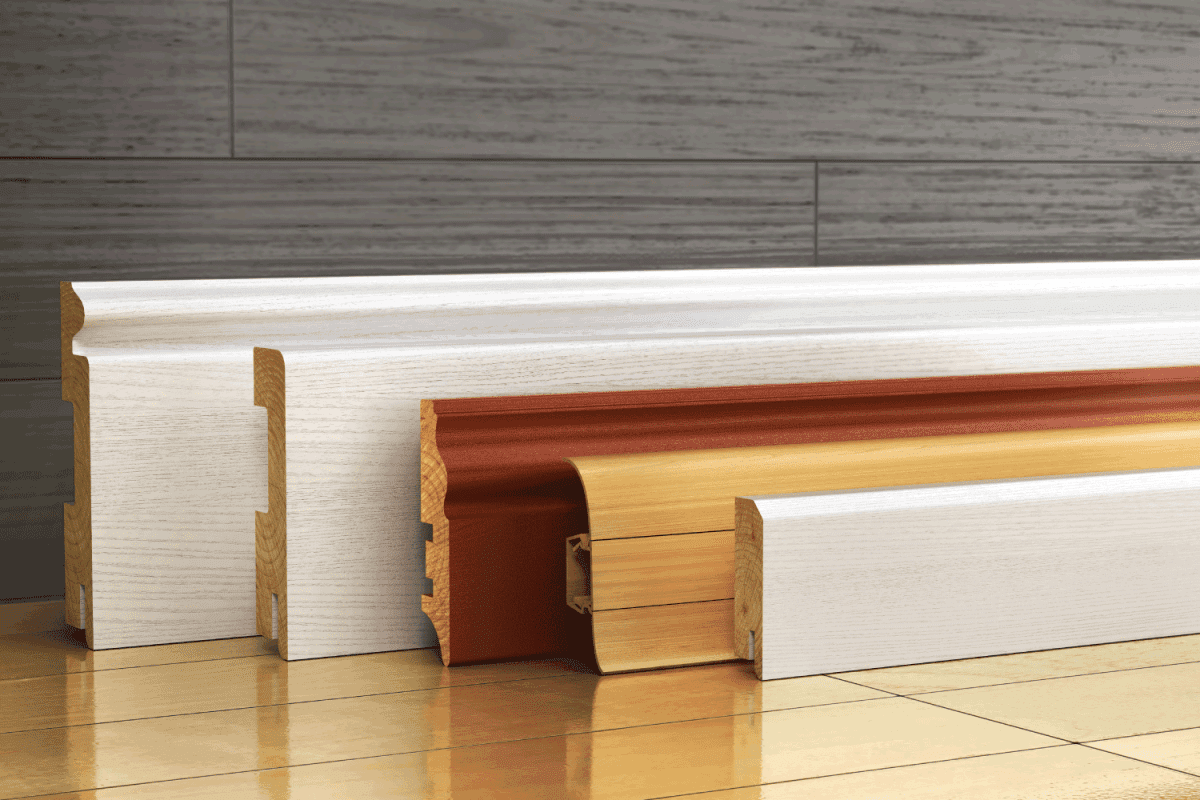 Set of wood skirting baseboard different form on a wood background