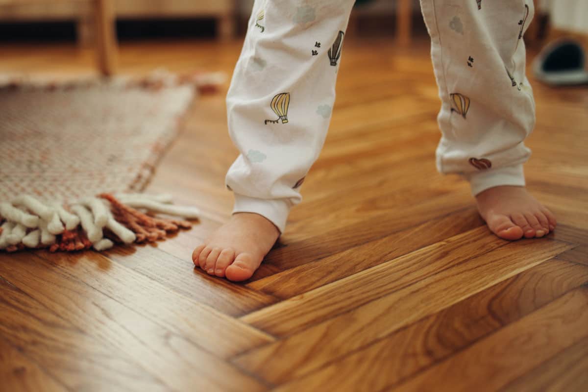 Shot of a Barefoot Anonymous Child in their Pajamas