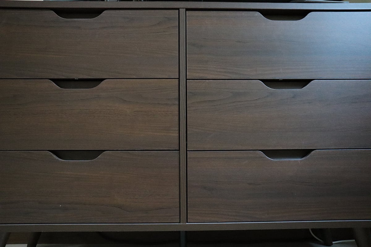 Dark brown wooden drawer cabinet in the house