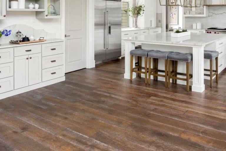 A luxury kitchen with hardwood floors. Pine Floor Splintering - What To Do?