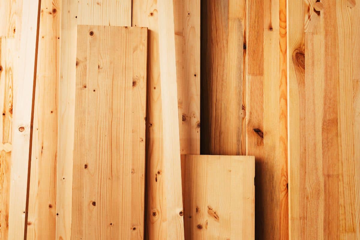 Pine wood floorboard planks in workshop ready to be used for hardwood flooring — Photo

