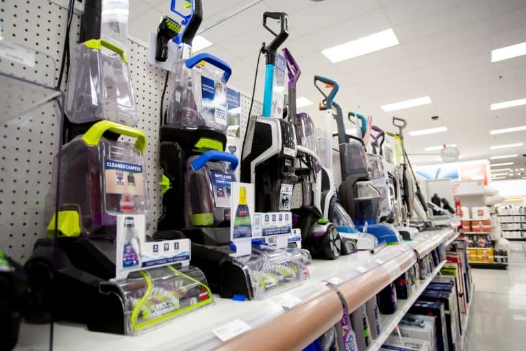A shelf space dedicated to variety of vacuum cleaners on display at a local department store, Bissell Carpet Cleaner Making High Pitched Noise—Why And What To Do?