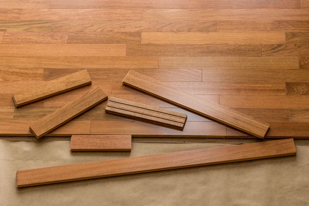 photo of an almost done wooden floor tiles, installing wooden floor tiles