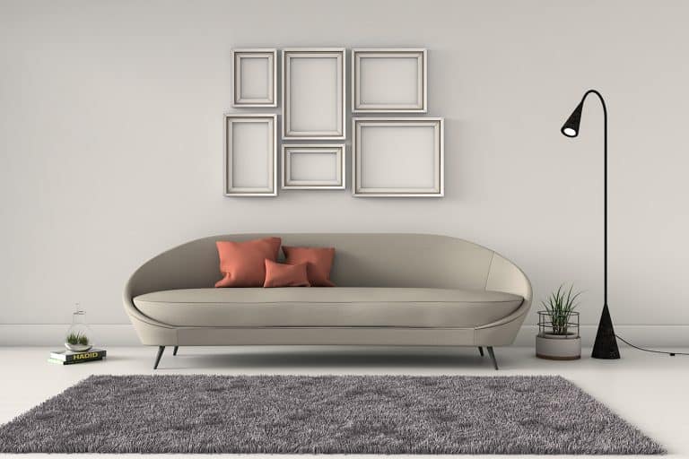 Poster mockup with vertical, horizontal frames on empty white wall in living room interior with grey sofa, round pillow with tropical pattern, carpet, lamp and plant in basket. - What Color Carpet Goes With Greige Walls