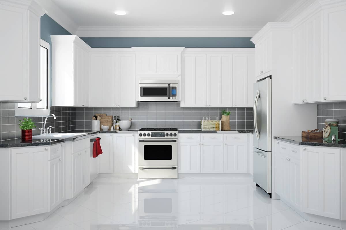 Polished and Neat - Interior of new white kitchen with kitchenware and clean tiles