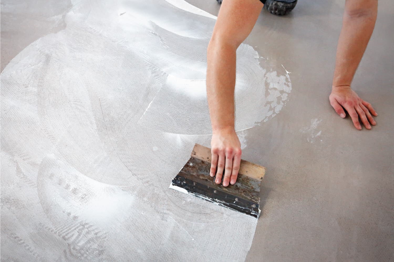 Worker spreading adhesive substance