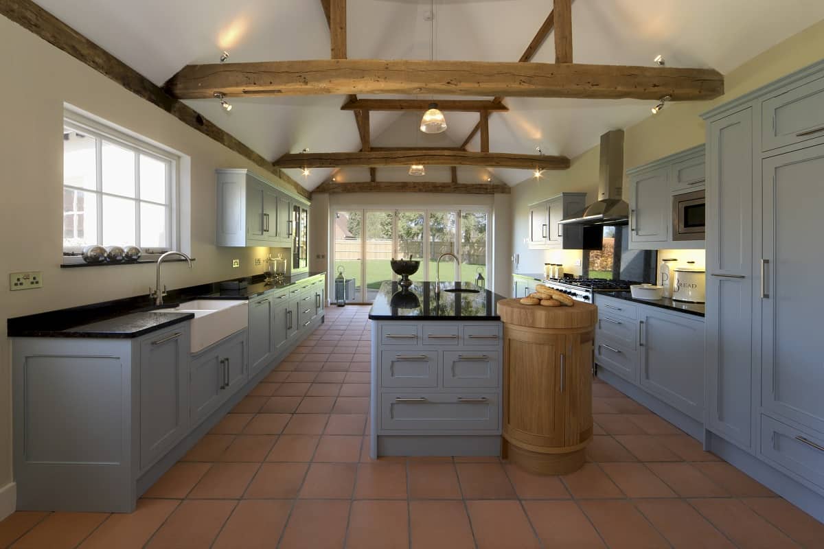 a beautiful farmhouse kitchen in a fully restored and rebuilt farm