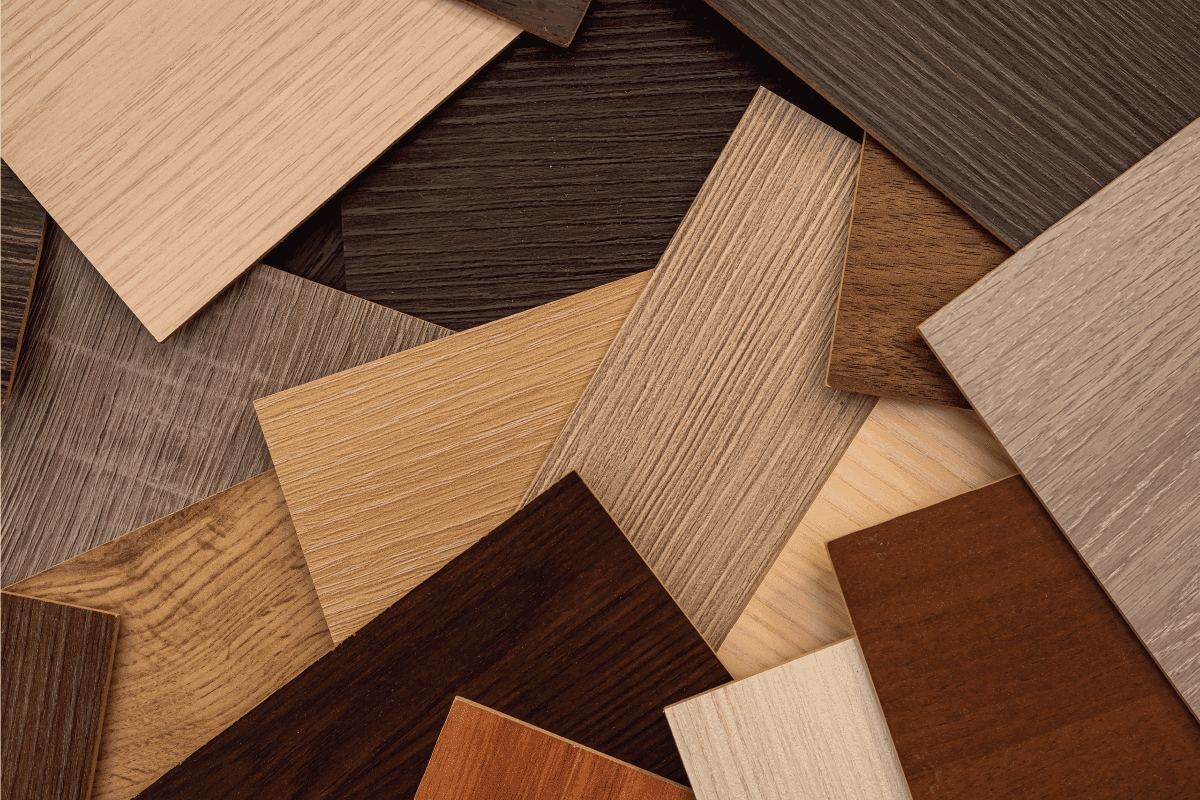 assorted flooring samples of vinyl and laminate. Pergo Vs. Smartcore Flooring Which To Choose