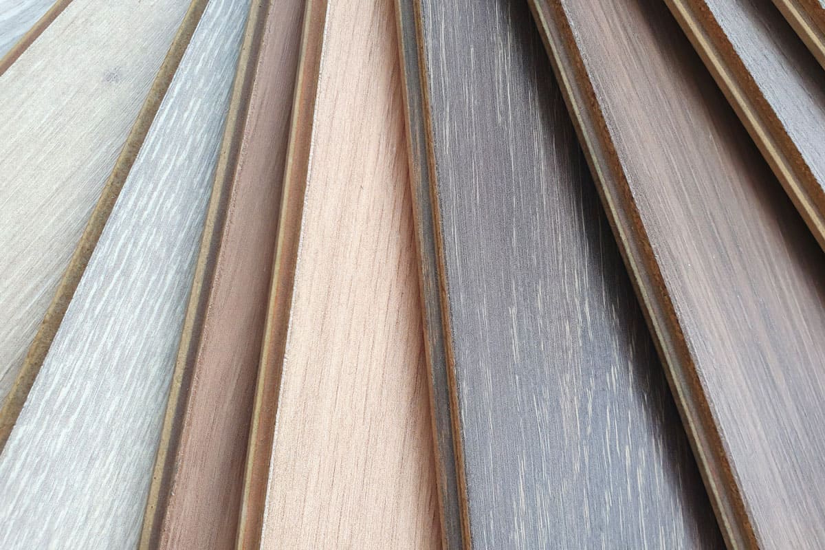 very close up photo of an engineered wood floorings different colors