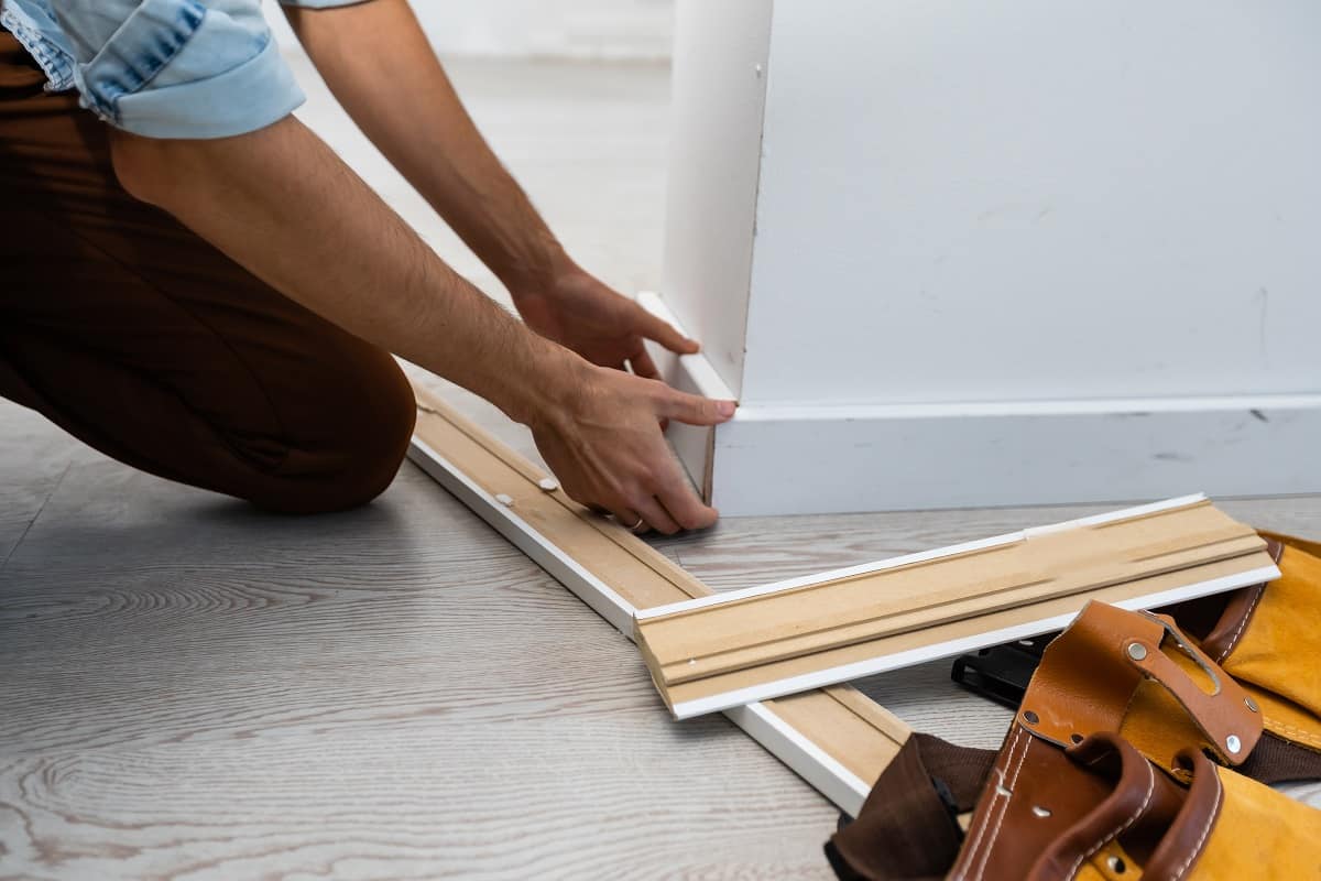 Nail the molding into the baseboard.