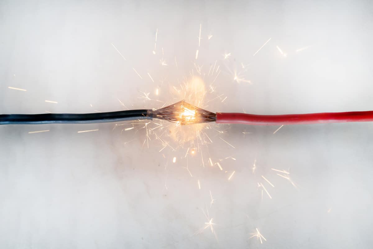 Short circuit of electrical wires sparks molten wires, fire from electrical wiring