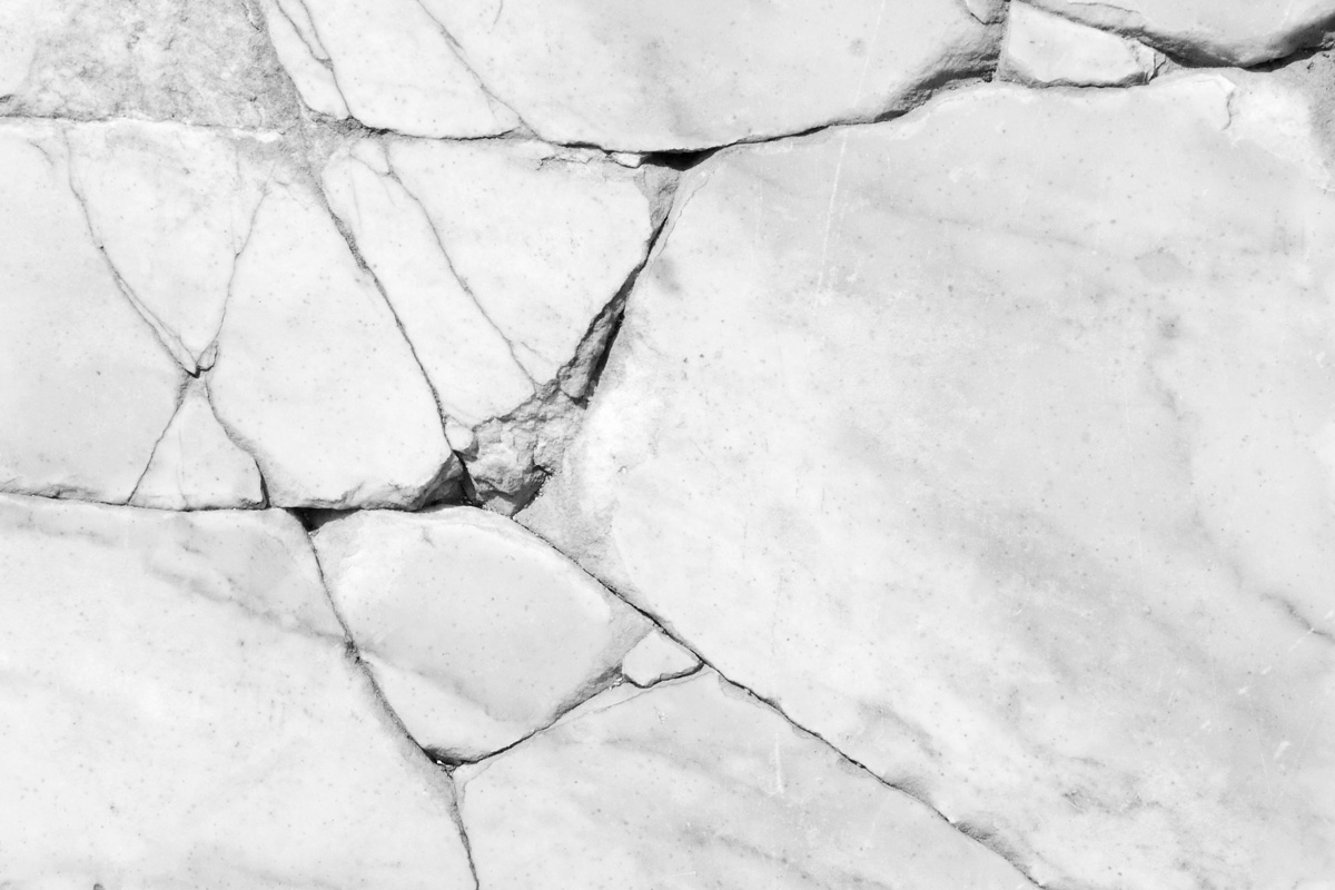 crack on marble background from a giant white rock
